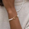 Bracelet Menottes Ursula acier doré or et nacre