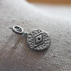 Charm acier oeil