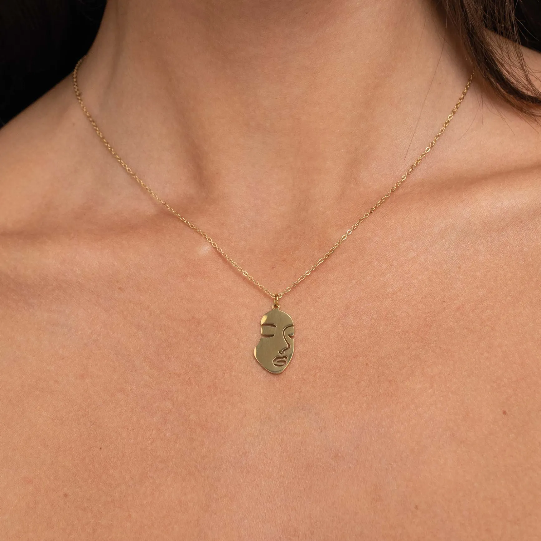 Collier Visage acier doré or